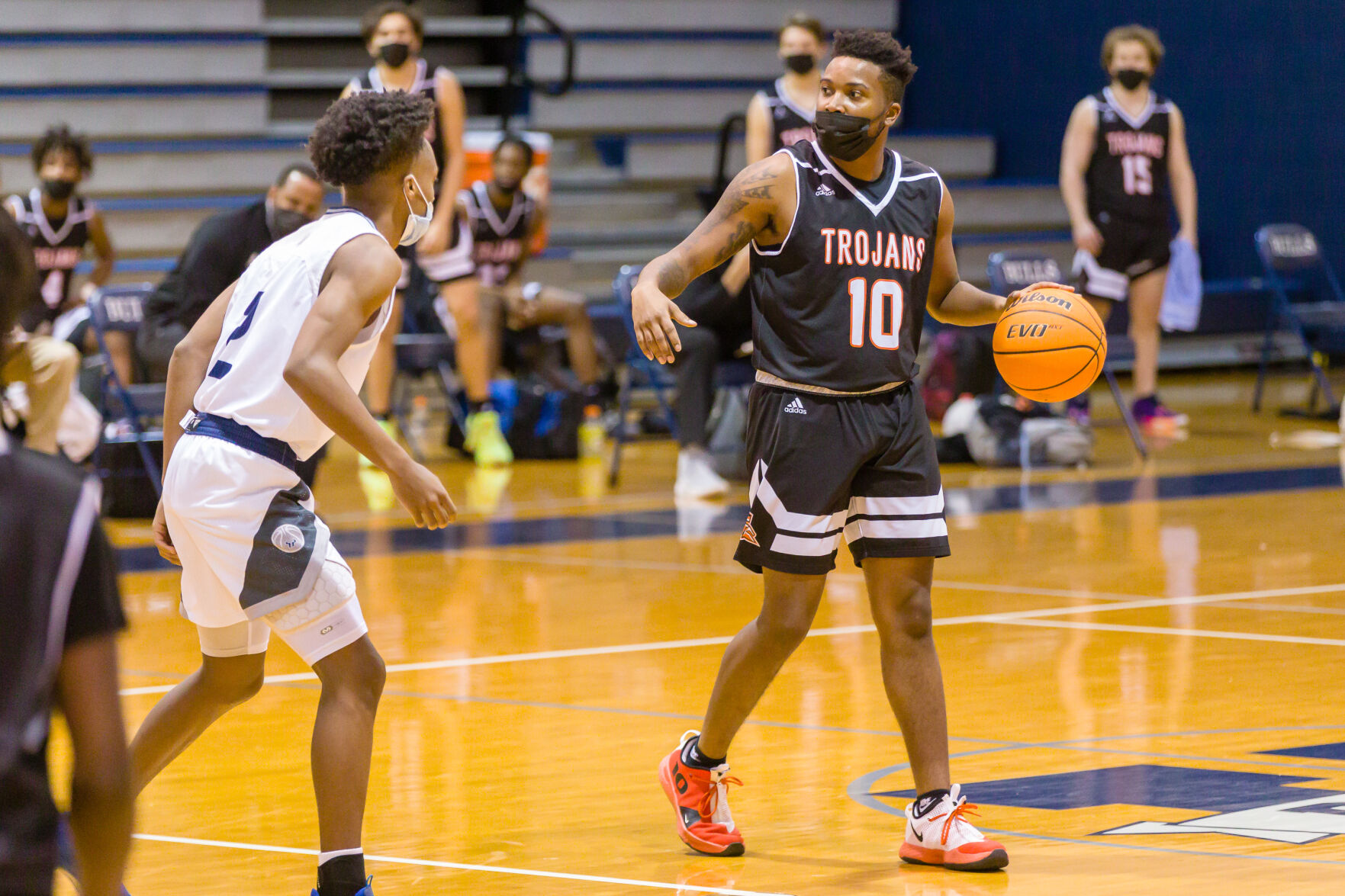 Boys Basketball: Hickory Ridge RaginÕ Bulls defeated the Northwest Cabarrus Trojans 64-56.